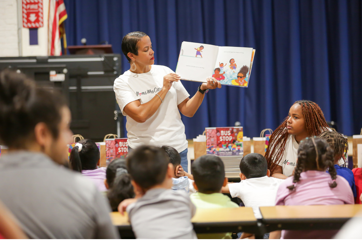 MWC reading to children.